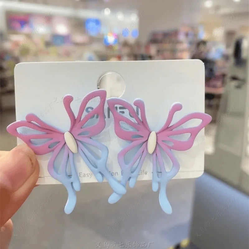 Purple Ice Butterfly Ear Clips