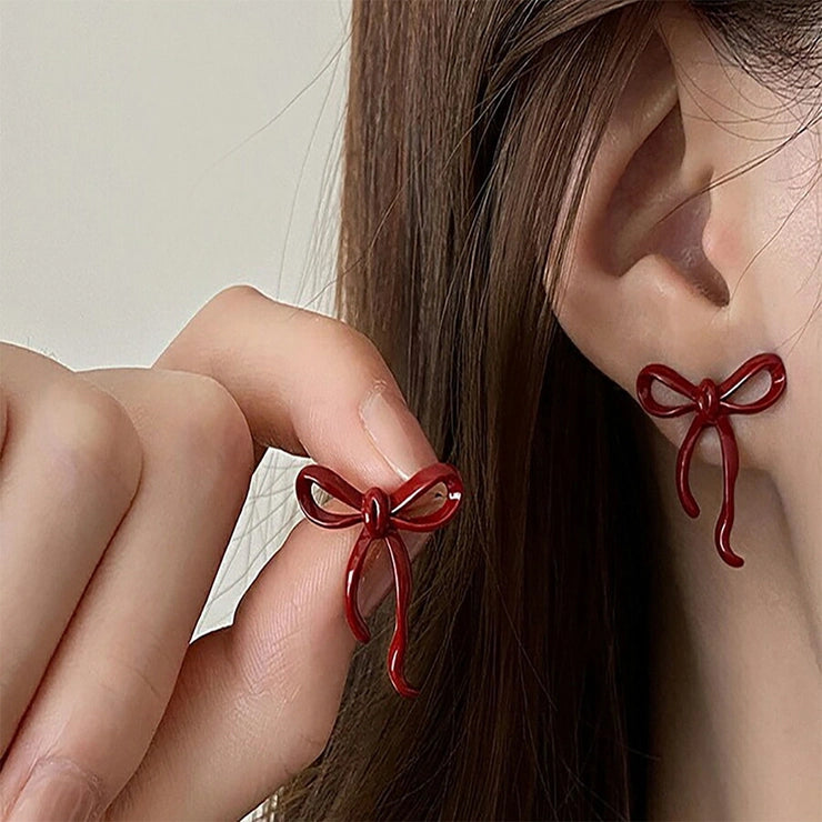 Khas Maroon bow' studs