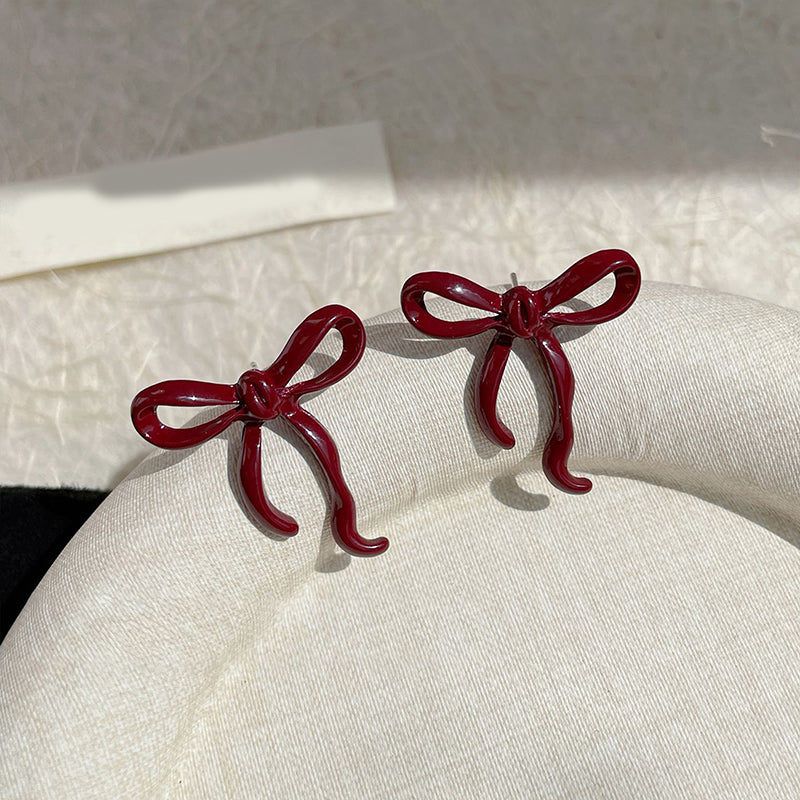 Khas Maroon bow' studs