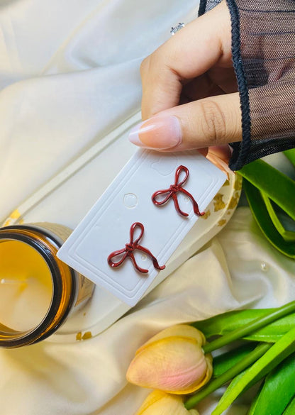 Khas Maroon bow' studs